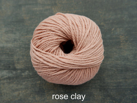 Knitting For Olive's Heavy Merino is a worsted weight yarn. Rose Clay