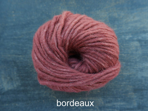 Wish from Drops Yarn is a Alpaca, Merino, Cotton, Bulky-sized  yarn. Bordeaux