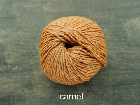 Knitting For Olive's Heavy Merino is a worsted weight yarn. Camel