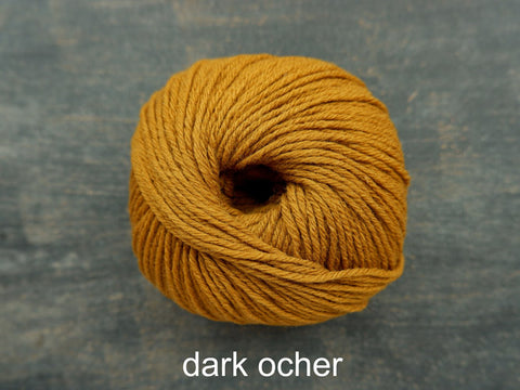 Knitting For Olive's Heavy Merino is a worsted weight yarn. Dark Ocher