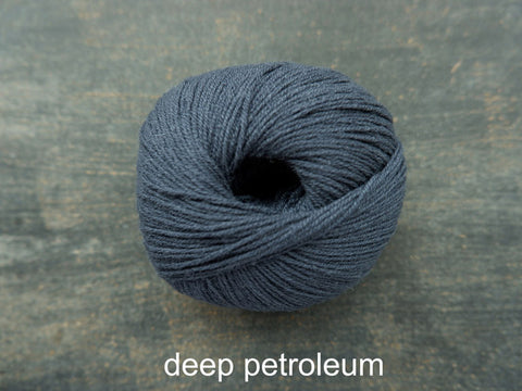 Knitting For Olive Merino. A fine fingering weight yarn. Deep Petroleum