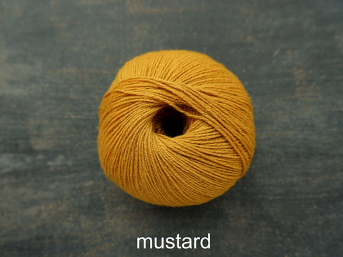 Knitting For Olive Merino. A fine fingering weight yarn. Mustard
