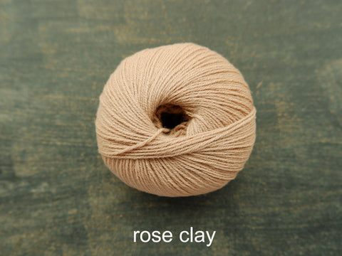 Knitting For Olive Merino. A fine fingering weight yarn. Rose Clay
