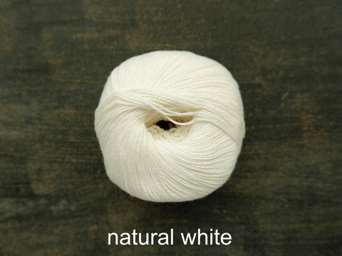 Knitting For Olive's Cotton Merino is a fine ,fingering weight yarn . Natural White