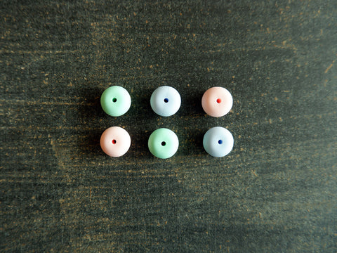 Point Protectors or needle stoppers for knitting needles.